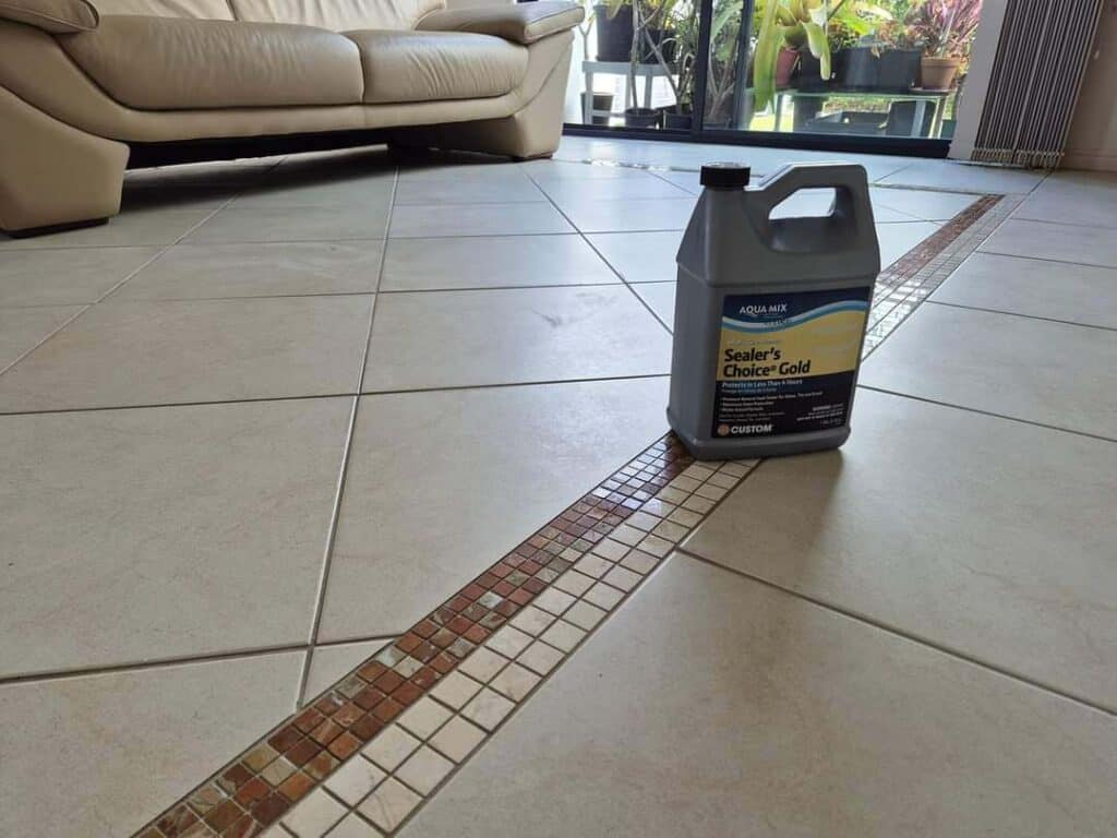 Grout sealer bottle on clean tiled floor